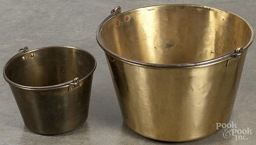 Two brass buckets, 19th c., 11 1/2'' h., 18'' dia. and 7 1/4'' h., 10 3/4'' dia.