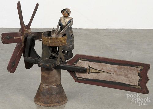 Painted pine and tin whirligig, early 20th c., of a woman washing clothes