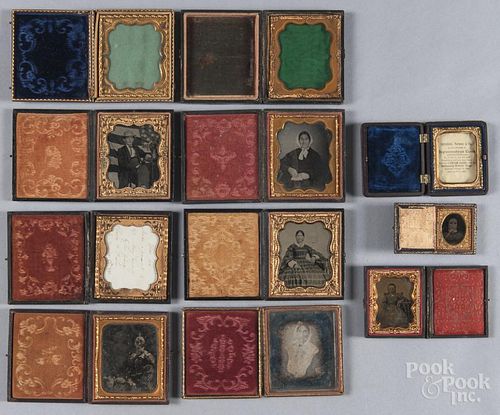 Daguerreotype and tin type family portraits, 19th c., together with five empty cases.