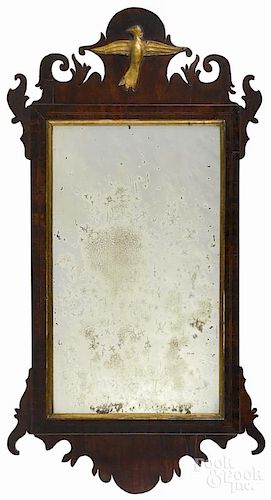 Chippendale mahogany looking glass, late 18th c., with a gilt phoenix on the crest, 36 1/2'' h.