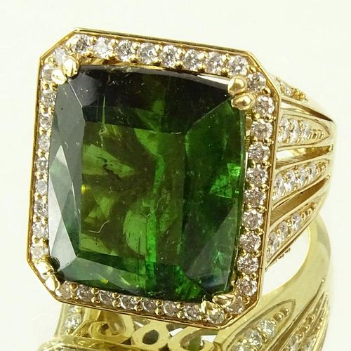 Approx. 22.0 Carat Emerald Cut Tourmaline, 2.0 Carat Diamond and 18 Karat Yellow Gold Ring. Tourmaline with vivid saturation of color. Signed 18K. Rin