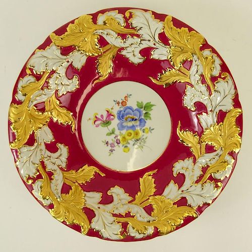 Large Meissen Hand Painted and Parcel Gilt Bowl With Red Border. Floral motif. Signed with crossed swords mark. Good condition. Measures 12" dia. Ship