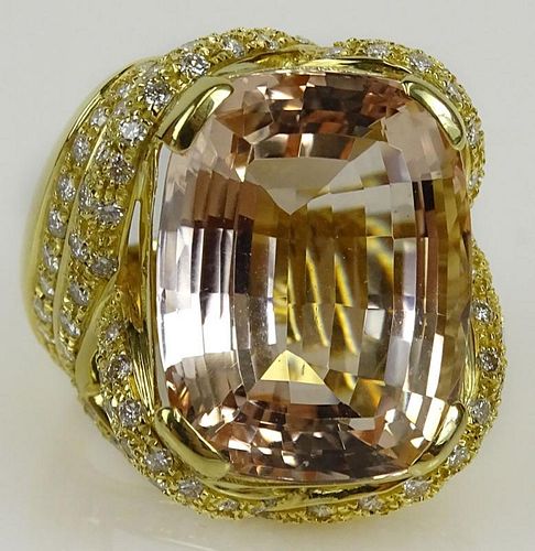 Lady's approx. 30.0 carat gem quality cushion cut kunzite, 2.50 carat round cut diamond and 18 karat yellow gold ring. Diamonds G-H Color, VS clarity.