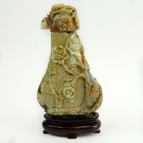 Antique Chinese Carved Iridescent Opal Magnum Snuff Bottle/Jar With Lid. Hardwood base. Relief carving depicting a floral motif. Unsigned. Chip to int
