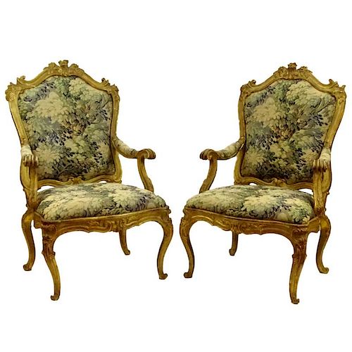 Large pair of 19th Century Italian carved and gilt wood fauteuils with modern tapestry upholstery. Unsigned. Rubbing, surface wear, repairs, overall g