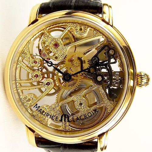 Men's Maurice Lacroix 18 Karat Yellow Gold Skeleton Watch with Box and Papers. Signed. Numbered MP7048 AL89559. Very good condition. Please note the G
