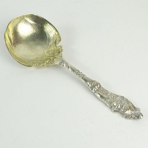 Large Gorham Art Nouveau Design Serving Spoon. Light gold wash on bowl. Signed Gorham Sterling H158. Good condition. Measures 10" and weighs approx. 5