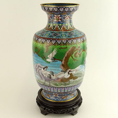 Chinese Cloisonne Enamel Vase with wood base. Unsigned. Good condition. Measures 15-1/4 inches tall and 9 inches wide. Shipping $65.00