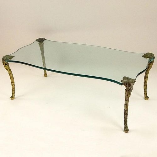 Mid 20th Century bronze and glass coffee table. Unsigned, possibly P.E. Guerin. Surface scratches to glass or in good vintage condition. Measures 17-1