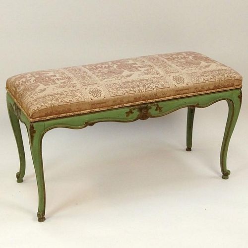 Early to mid 20th Century carved painted bench with upholstered top. Unsigned. Rubbing surface wear, separation at joints. Measures 20" H x 36" L x 16