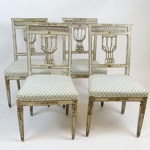 Set of 4 19th Century, probably Italian carved and painted wood side chairs. Unsigned. Paint loss, Rubbing, surface wear, antique distressed condition