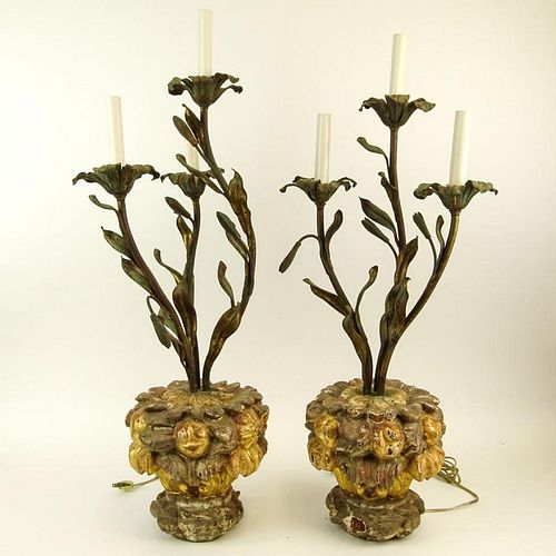 Pair of Early 20th Century Carved Gilt Wood and Painted Tole Three Light Flower Form Candelabra. Unsigned. Surface wear, evidence of old insect holes,