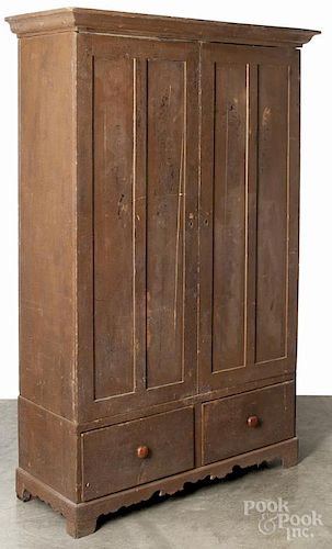 Painted pine wardrobe, late 19th c., retaining an old crackled brown surface, 82 1/2'' h., 48'' w.