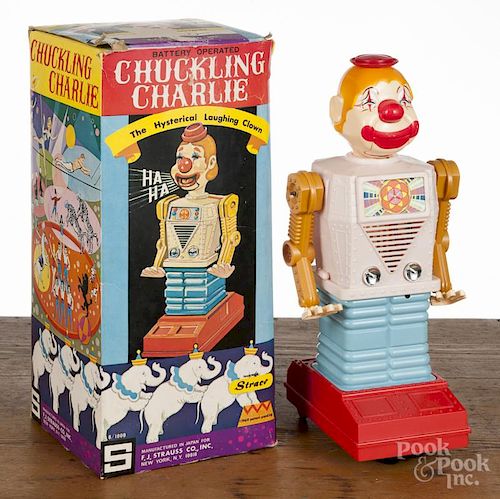 Plastic battery operated Chuckling Charlie clown, mid/late 20th c., with the original box, 14'' h.