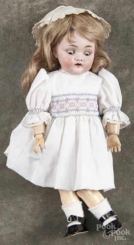 Kestner bisque head doll, 19th c., inscribed Made in Germany A 5 143, with an open mouth