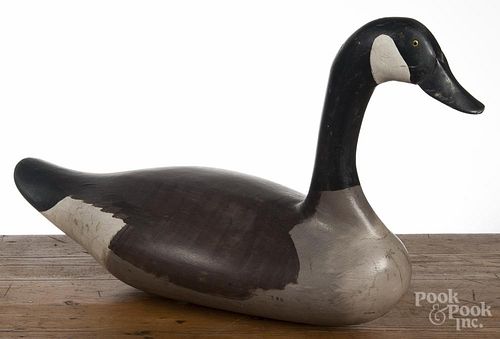 Chesapeake Bay carved and painted high head goose decoy, mid 20th c., 25'' l.