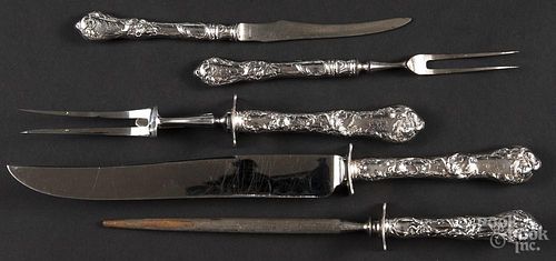 Five-piece sterling silver handled carving set with an art nouveau design.