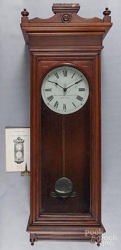 Self Winding Clock Co. cherry wall clock, 43'' h.