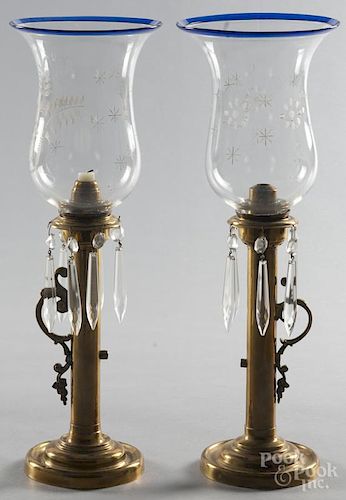 Pair of brass candleholders, late 19th c., with etched glass shades, 17 1/2'' h.
