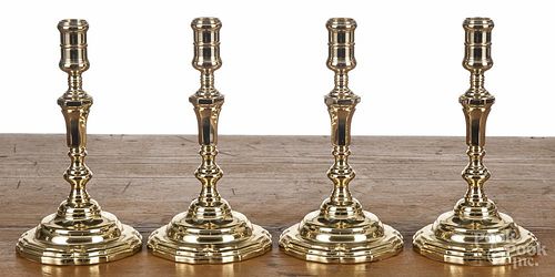 Set of four Baldwin brass candlesticks, 8 1/2'' h.