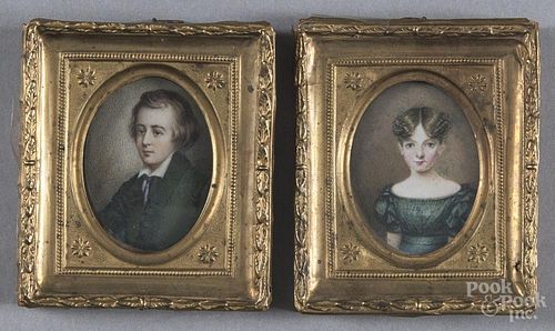 Pair of miniature watercolor on ivory portraits of a man and woman