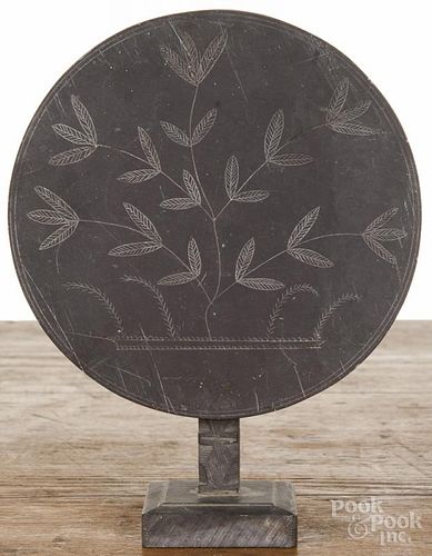 Miniature slate tea table, 19th c., with an etched tilting top, 4 1/2'' h., 5 1/2'' w.