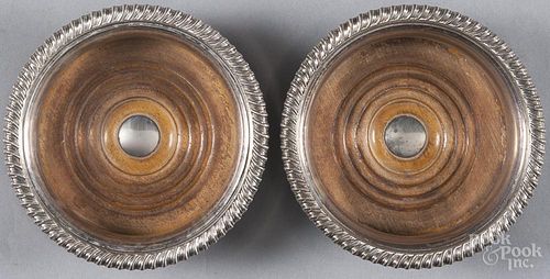 Pair of Sheffield plate wine coasters, 2'' x 6 1/4''.