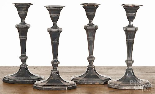 Set of four Sheffield plate candlesticks, 19th c., 11 1/2'' h.