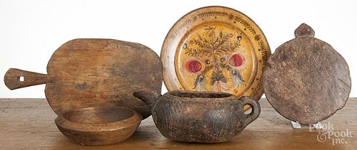 Woodenware, 19th/20th c., to include an unusual teapot, 5'' h., a bowl, and cutting boards.