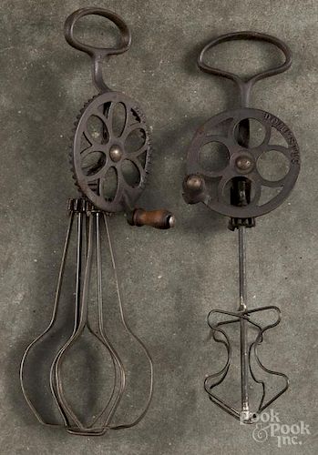 Two cast iron and wire egg beaters, early 20th c., one stamped Domestic, 10'' l.