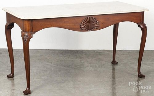 Kittinger mahogany slab table, 28'' h., 52'' w.