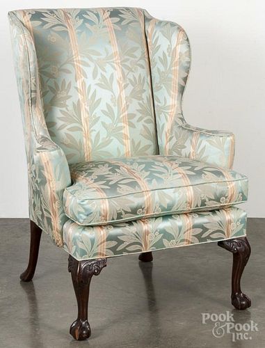 Kittinger Chippendale style mahogany wing chair.
