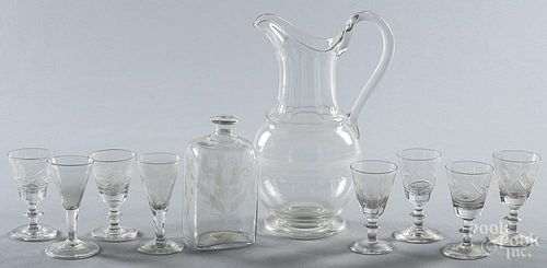 Eight engraved and cut glass cordials, 19th c., together with a pitcher, 10 3/4'' h.