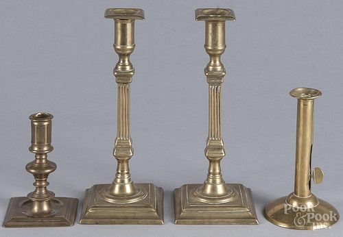 Pair of English brass candlesticks, early 19th c., together with two single sticks, tallest - 11''.