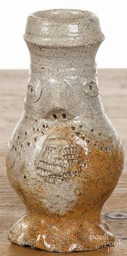 Small Bellarmine jug with a molded face, 4'' h.