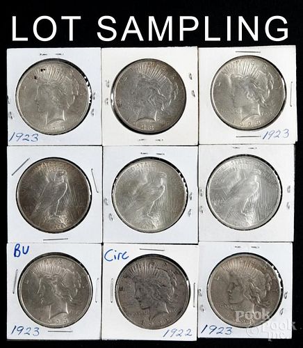Thirty-four silver Peace dollars, to include a 1923, a 1923 D, and a 1923 S