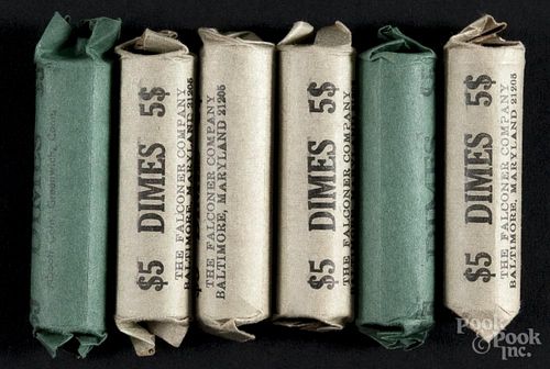 Three hundred assorted silver dimes, rolled, average circulated.