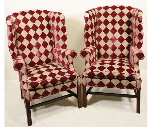 PAIR OF UPHOLSTERED WING BACK CHAIRS