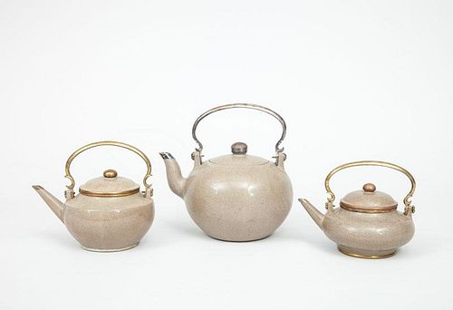 Three Modern Chinese Gilt-Metal-Mounted Tan-Glazed Pottery Teapots