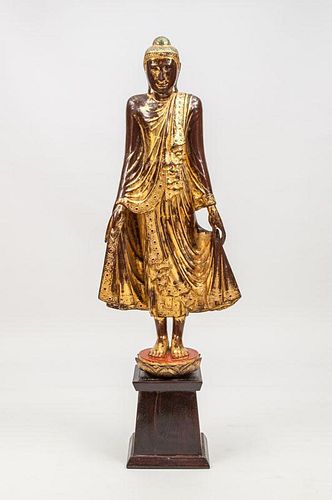 Painted and Parcel-Gilt Metal Standing Figure of Buddha