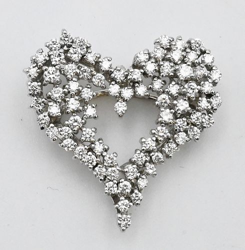 18 Karat White Gold and Diamond Brooch, heart shaped, height 7/8 inches, 5.9 grams.