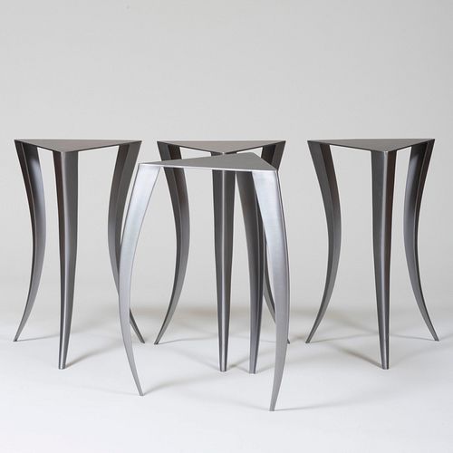 Set of Four Patinated Metal Triangular Side Tables