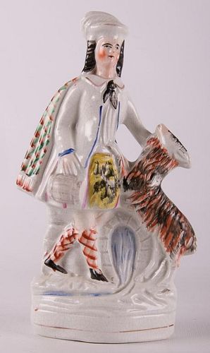 Staffordshire Scotsman and Goat Figurine
