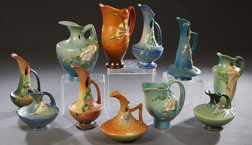Group of Eleven Pieces of Roseville Pottery, consisting of 102-10, Clematis; 172-1, Peony; 276-10, Peony; 14-10, Magnolia; 908-10, Fuchsia Ewer; 18-7,