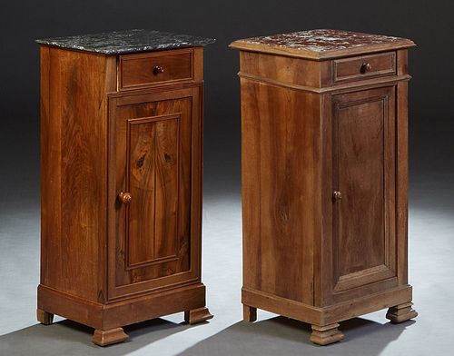 Near Pair of French Louis Philippe Carved Walnut Marble Top Nightstands, 19th c., one with a figured gray marble, the other with an inset figured brow