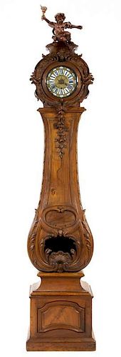 A Louis XV Style Walnut Tall Case Clock Height 107 3/4 inches.