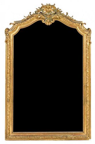 * A Louix XV Style Giltwood Pier Mirror Height 63 x width 40 inches.
