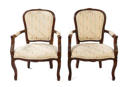 A Pair of Louis XIV Style Fauteuils Height 34 inches.