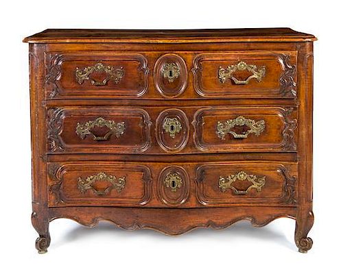 A French Provincial Walnut Commode Height 40 x width 53 1/2 x depth 26 1/2 inches.