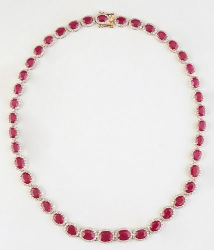 14K Yellow Gold Link Necklace, each of the 41 oval links with a graduated oval ruby, atop a border of round diamonds, total ruby wt.- 46.97 cts., tota